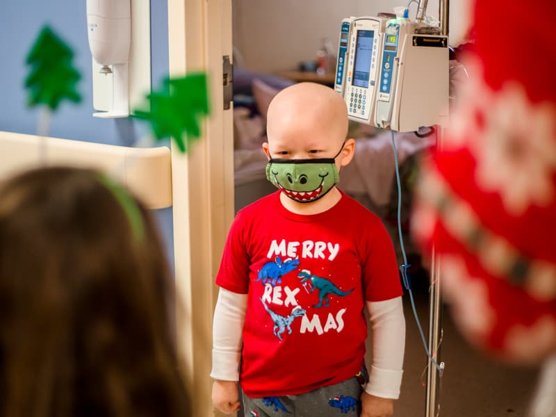 Children's of Mississippi patient Cash Ward of Summitt wore his dinosaur Christmas pajamas for the "Rockin' Around Children's" parade Dec. 10.