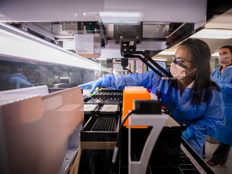 Sara Kemp, a medical technologist, processes COVID-19 test samples in the Medical Center's Molecular Pathology Laboratory.