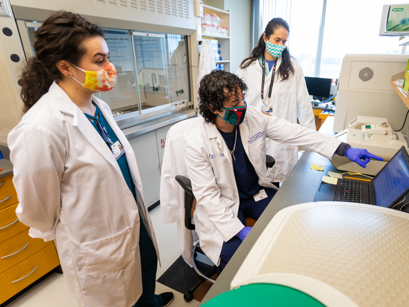 Taking part in research to promote better health outcomes for patients with diabetes are, from left, Natalie Wilson, a physiology and biophysics researcher; Osvaldo Gonzalez, a student in the School for Graduate Studies in the Health Sciences; and Laura Coats, a physiology and biophysics postdoctoral research fellow,