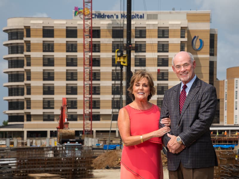 Lampkin and Susie Butts visit the Sanderson Tower under construction.