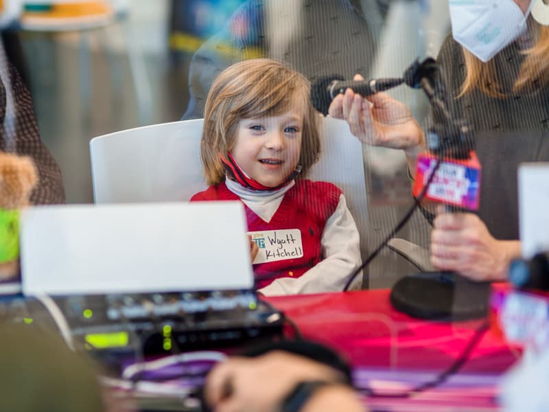 Wyatt Kitchell thanks listeners during the radiothon.