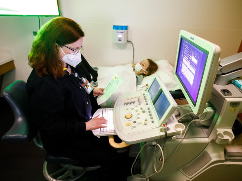 Children's of Mississippi sonographer Paula Prem takes a look at Allie Henderson's information.