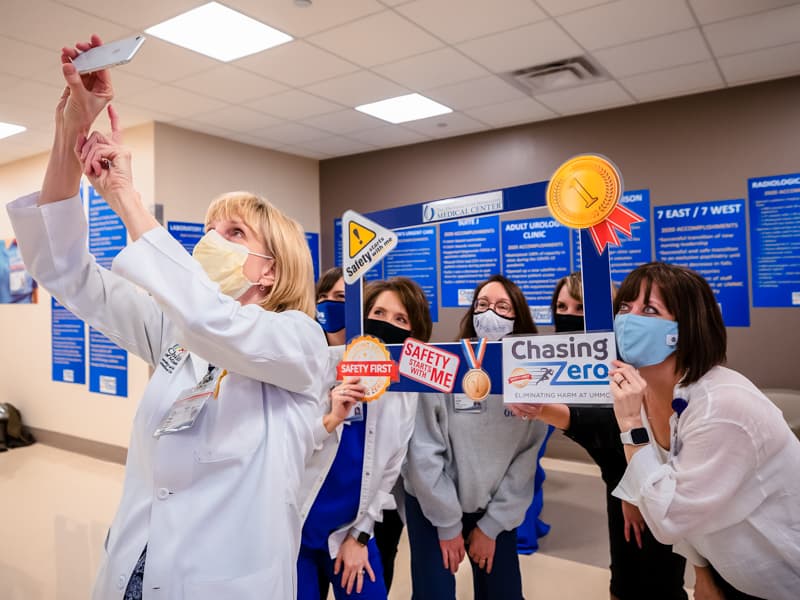 Dr. Phyllis Bishop, left, chief quality officer, takes a 