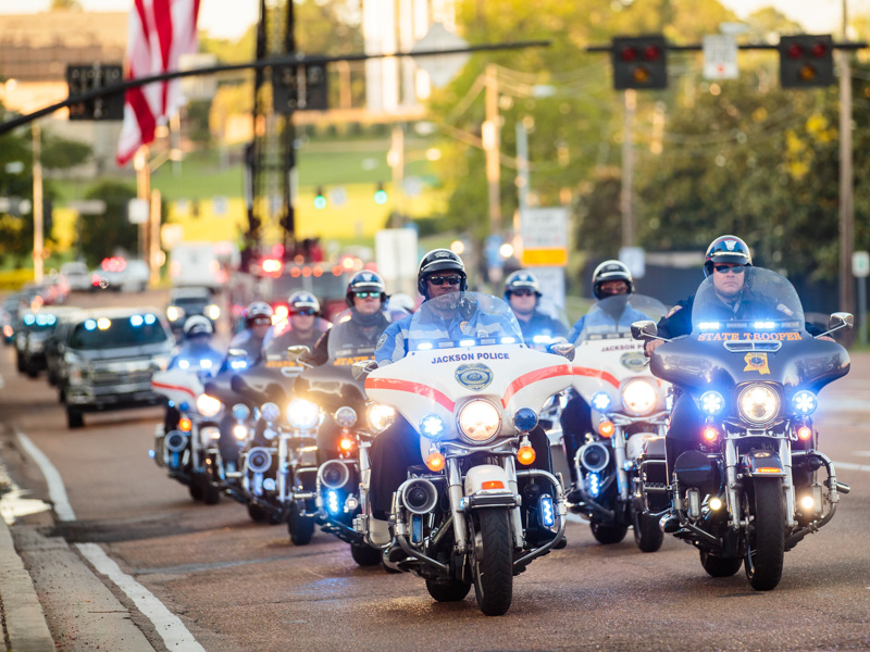 Members of the Jackson Police Department motorcycle patrol lead a parade down State Street to help kick off UMMC's Employee Appreciation Week.