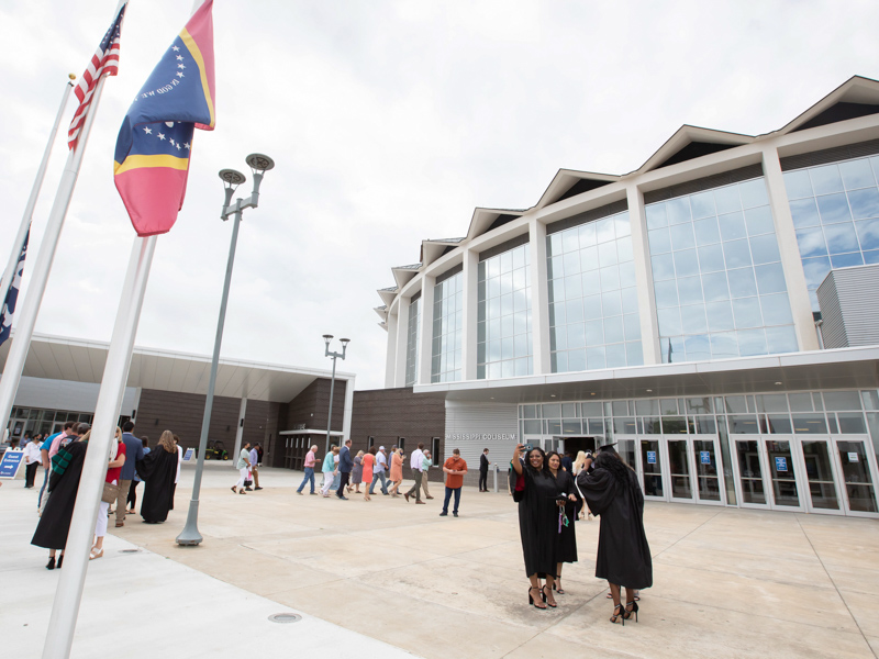 Kendra Conley takes a selfie outside the Mississippi Coliseum before lining up for UMMC's commencement ceremonies May 28.