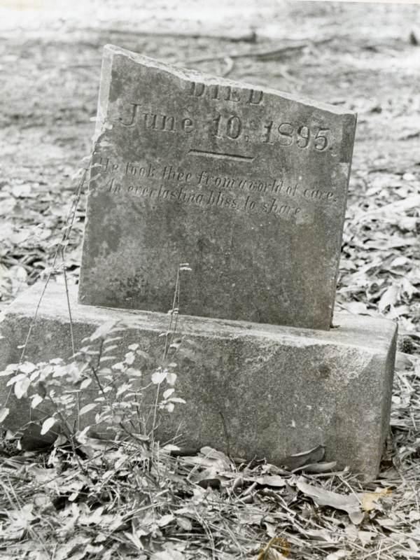 These headstones are among those relocated to the UMMC Cemetery in 1992. The photos were probably taken in the 1970s. Anecdotal evidence cited by Lida Gibson suggests that they were located in a now-wooded area between East University Drive Avenue and St. Dominic Hospital, north of where the 2013-2014 exhumations took place.