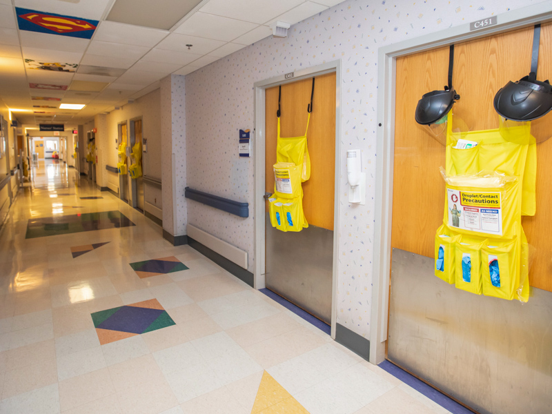 PPE lines the halls of a patient floor at Children's of Mississippi. On Monday, there were 22 children in the hospital as a result of COVID-19.