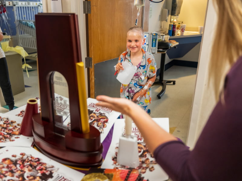 MSU's CWS trophy takes Children's of Mississippi victory lap