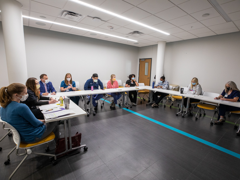 Experts in surgery, otolaryngology, speech-language pathology, psychology and more discuss each patient seen on a recent clinic held for cleft patients at Children's of Mississippi.