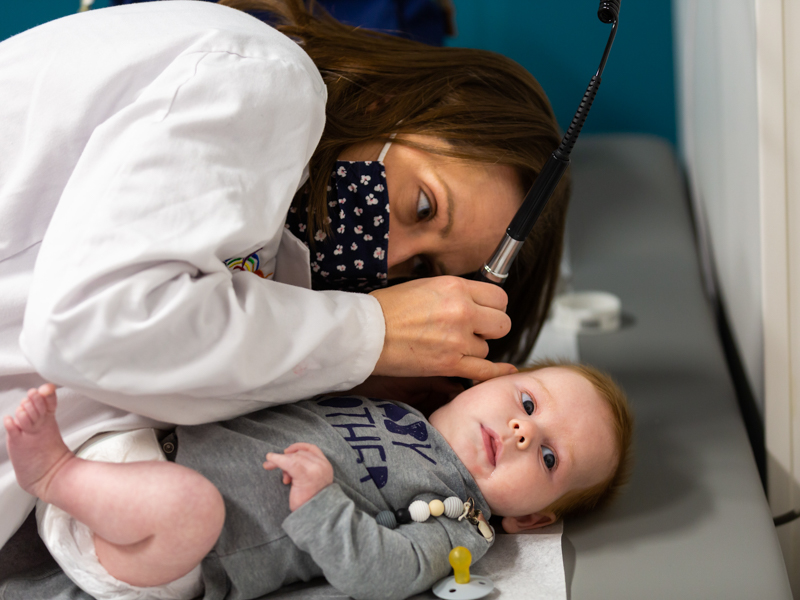 Dr. Sarah Jones checks the ears of Theodore Watts of Morton during his visit to the Sanderson Tower’s specialty clinics.