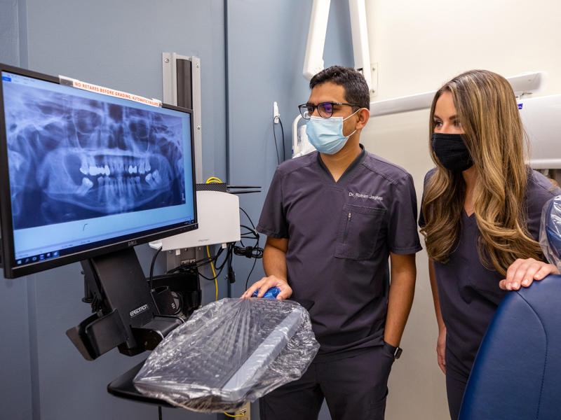 School of Dentistry first-year student Tammy Vujanovic began a project on using artificial intelligence in clinical dentistry during the summer UPSTART program in the Schoolof Dentistry. She's pictured with her mentor, Dr. Rohan Jagtap, assistant professor of Care Planning and Restorative Sciences.