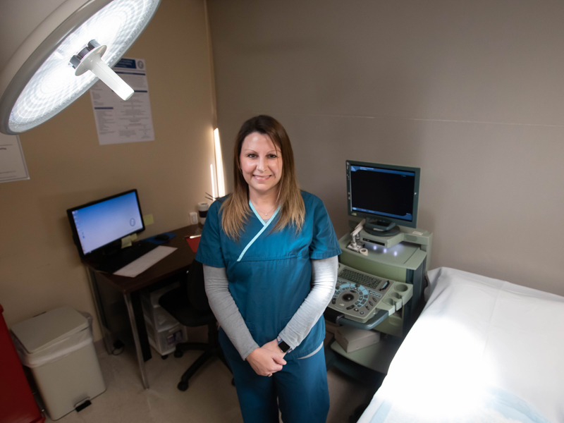 Keisha Prestwood, a surgical tech of 21 years, is considered the "go-to" in the outpatient urology clinic at Select Specialty Hospital.
