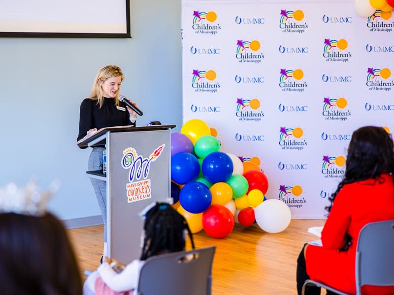 University of Mississippi Medical Center development liaison Kathryne Lewis announces Nolee as the state's 2022 Children's Miracle Network Hospitals Champion.