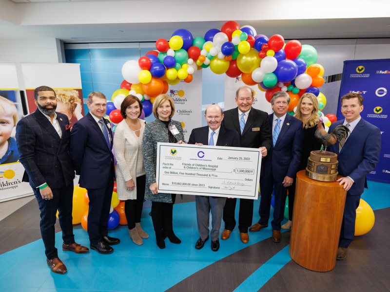 Celebrating a record-breaking $1.5 million donation raised through the Sanderson Farms Championship are, from left, Jackson Mayor Chokwe Antar Lumumba; Children's of Mississippi CEO Guy Giesecke; Dr. Mary Taylor, Suzan Thames Chair and professor of pediatrics; Dr. LouAnn Woodward, vice chancellor for health affairs and dean of the School of Medicine; Sanderson Farms CEO and board chairman Joe Sanderson Jr.; Century Club Charities President Pat Busby; Sanderson Farms Championship executive director Steve Jent; Friends of Children's Hospital executive director Rochelle Hicks; and Friends of Children's Hospital board chairman John Scarbrough.