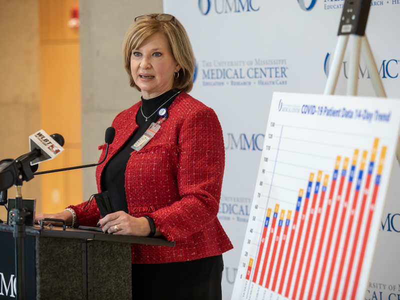 Dr. LouAnn Woodward, vice chancellor for health affairs and dean of the School of Medicine, speaks to media about UMMC's COVID-19 patient numbers.