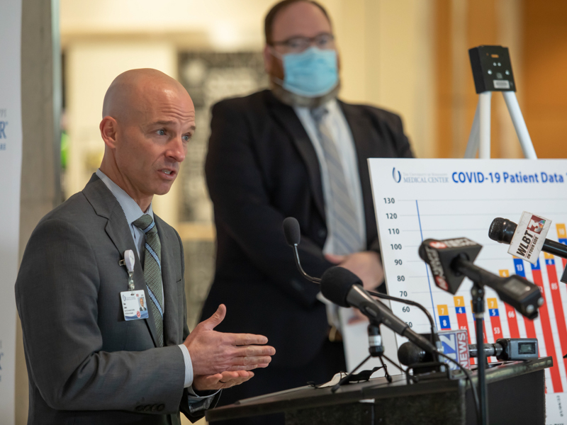 Dr. Alan Jones, associate vice chancellor for clinical affairs, speaks to media about Covid-19 numbers in the latest outbreak of the omicron variant Tuesday, Jan. 11, 2022.