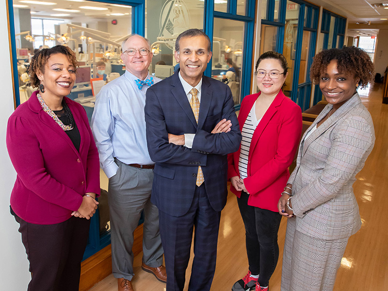 School of Dentistry Dean Sreenivas Koka, center, is pictured with his diversity, equity and inclusion team, from left, Dr. Kristin Nalls, Dr. William Boteler, Dr. Yuanyuan Duan and Dr. Alexa Lampkin.