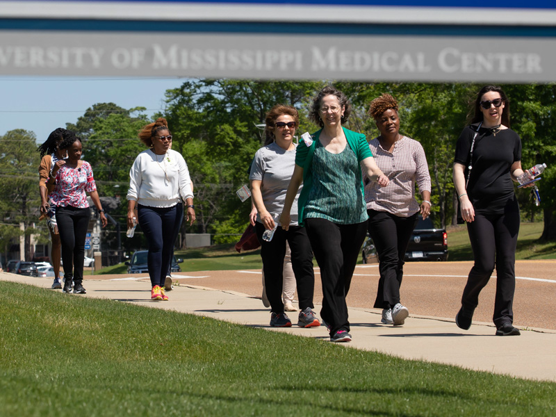 UMMC employees make a trek around campus Friday to celebrate National Walking Day.  Melanie Thortis/ UMMC Communications 