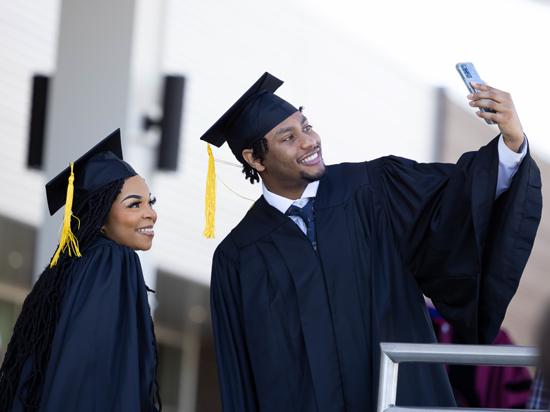 Medical Laboratory Science graduates Jada O'Banner and Kheri Strong take a selfie prior to commencement.