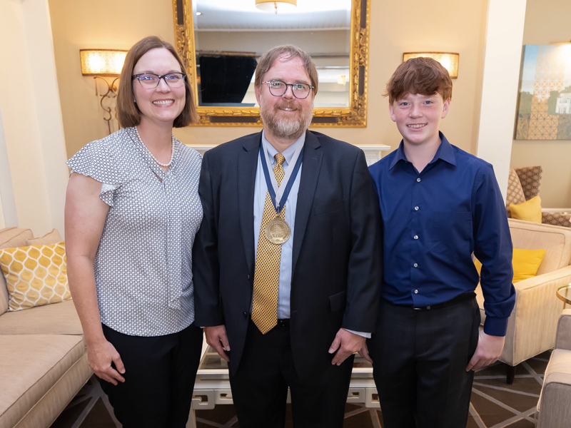 Dr. Anderson Collier, D. Jeanette Pullen Chair of Pediatric Hematology-Oncology, is pictured with wife Rachel and son Harrison. Melanie Thortis/ UMMC Communications