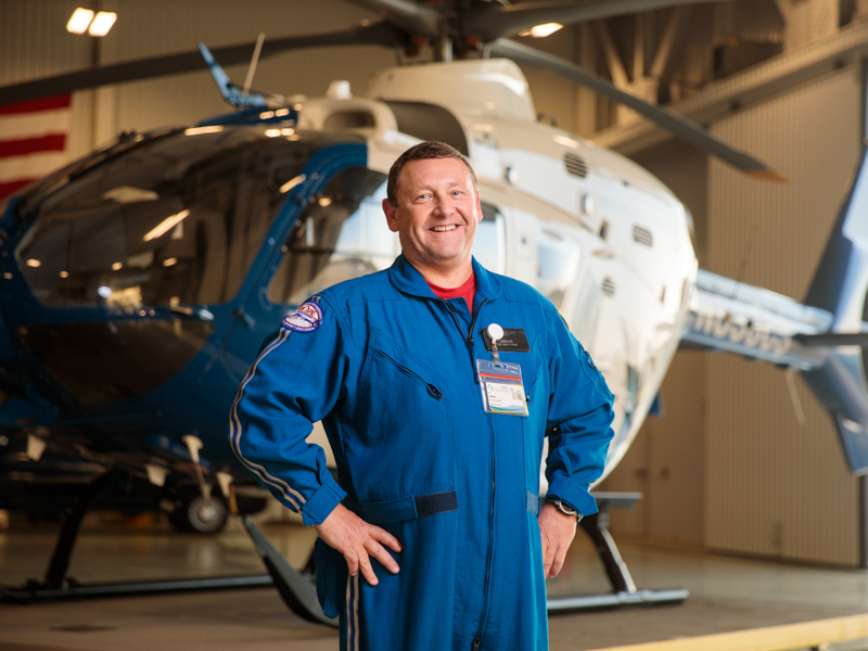Bert "Bo" Sullivan, one of AirCare's original "Flying Quartet" crew members, retires this month after a UMMC career spanning more than 30 years. Joe Ellis/ UMMC Communications