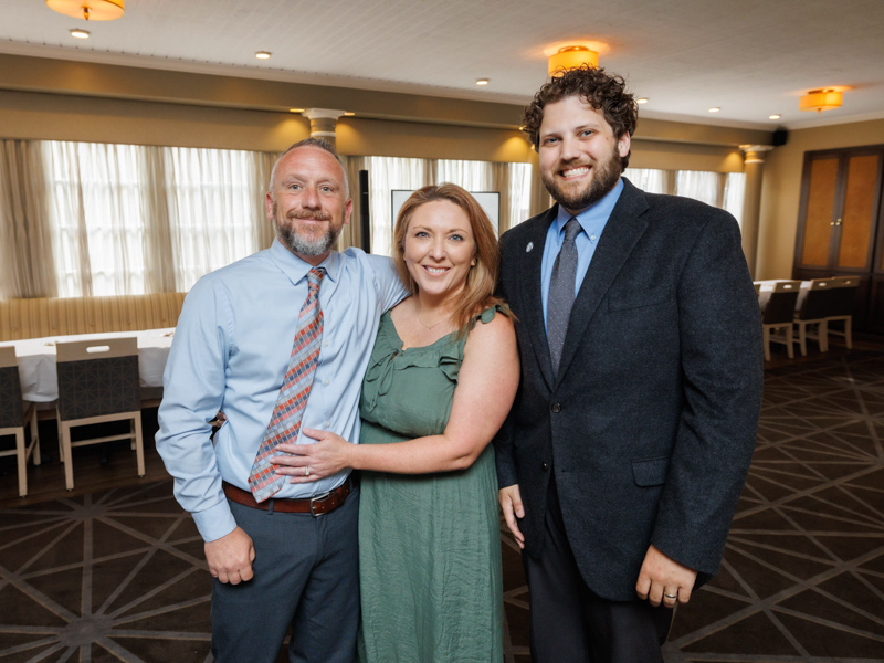 Wesley Smith, Children's of Mississippi director of nursing, pediatric emergency services and pediatric intensive care, and his wife, Sheri Smith, and PICU nurse manager Gordon Gartrell smile at a celebration for the Campaign for Children's of Mississippi at the Fairview Inn. Joe Ellis/ UMMC Communications 