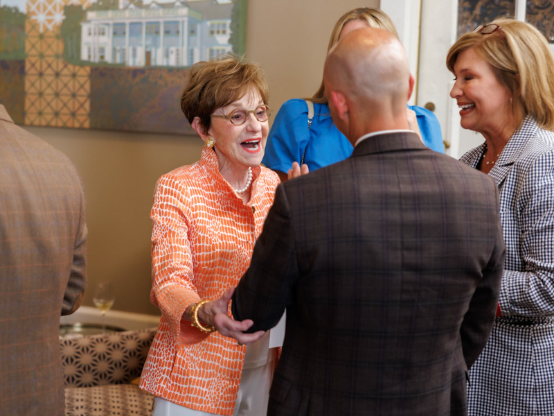 Kathy Sanderson, who with husband Joe Sanderson chaired the Campaign for Children's of Mississippi, greets Dr. Alan Jones, associate vice chancellor for clinical affairs, and Dr. LouAnn Woodward, vice chancellor for health affairs and dean of the School of Medicine. Joe Ellis/ UMMC Communications 