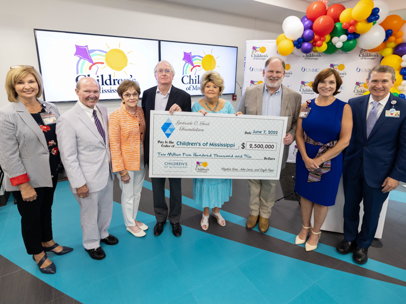 Celebrating the $2.5 million donation from the Gertrude C. Ford Foundation that helped push the Campaign for Children's of Mississippi to $101.5 million are, from left, Dr. LouAnn Woodward, vice chancellor for health affairs and dean of the School of Medicine; Joe F. Sanderson, CEO and board chairman of Sanderson Farms and, with wife Kathy Sanderson, chair of the Campaign for Children's of Mississippi; Stephen Sims, director of the Gertrude C. Ford Foundation; Cheryle Sims, president of the Gertrude C. Ford Foundation; John Lewis, vice president and treasurer of the Gertrude C. Ford Foundation; Dr. Mary Taylor, Suzan B. Thames Chair and professor of pediatrics; and Children's of Mississippi CEO Guy Giesecke.