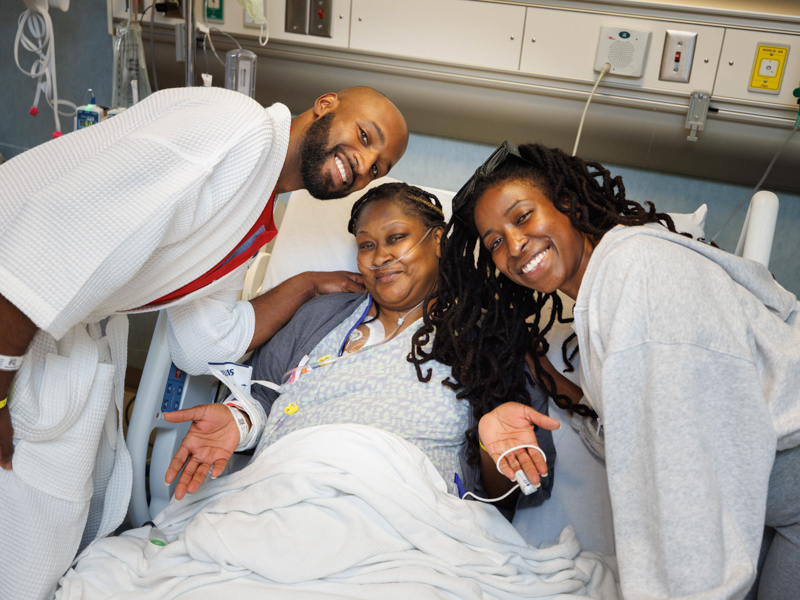 From left, Quinten Hogan; Hogan's mom, Tawanna Davis; and Hogan's girlfriend, Taylor Brown, share a moment following Davis' transplant surgery. Hogan donated his left kidney to his mom.