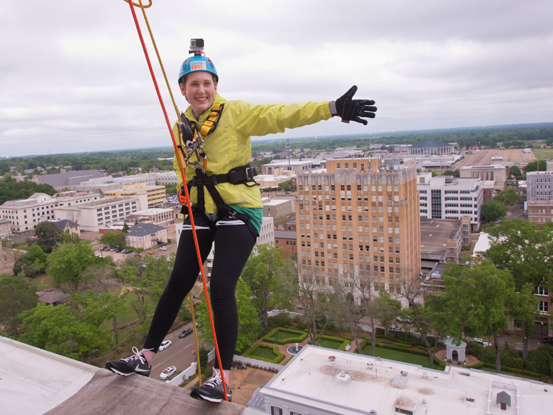 In this 2016 file photo, Maggie Hanberry poses for a photo before rappelling down the Trustmark building in downtown Jackson during the Over the Edge with Friends fundraiser for Friends of Children's Hospital.