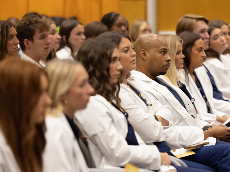 Wearing their white coats, 102 juniors in the traditional Bachelor of Science in Nursing program are now in the clinical phase of their education. Melanie Thortis/ UMMC Communications 