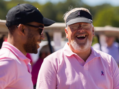 Berry, right, is taking part in this year’s Real Men Wear Pink fundraiser. With him is previous participant  Dr. Jared Davis, a UMMC plastic surgeon and assistant professor in the Department of Surgery.