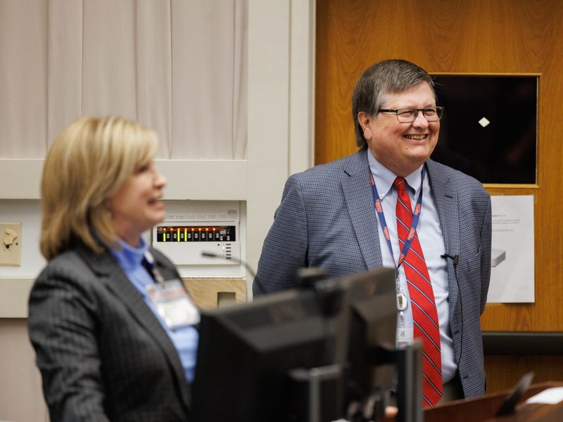 State Health Officer Dr. Daniel Edney, left, is introduced by Dr. LouAnn Woodward, vice chancellor for health affairs, before Edney's remarks to the Oct. 31 Vice Chancellor's Lecture Series. Joe Ellis/ UMMC Communications