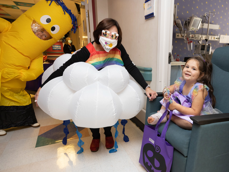 Dr. Mary Taylor, dressed as the Children's of Mississippi logo, visits with patient JoshLynn Gray of Union. Melanie Thortis/ UMMC Communications 