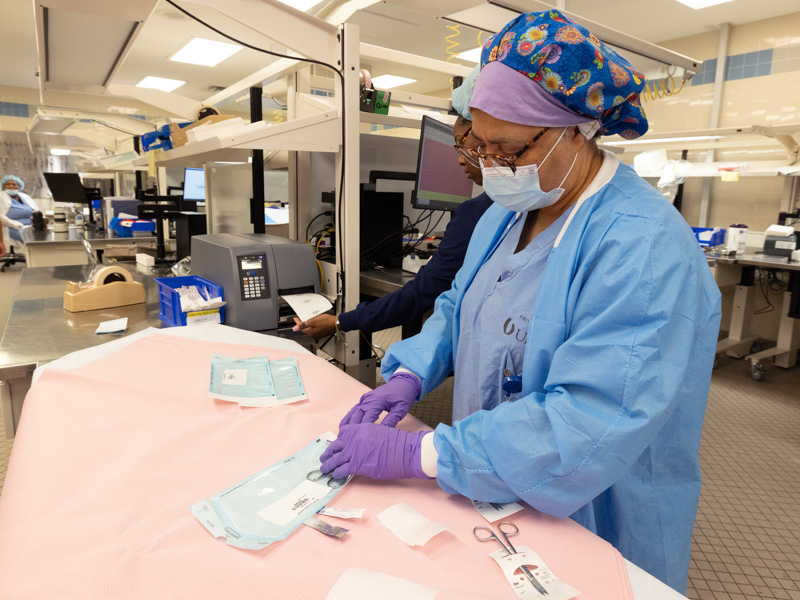 Sterile Processing technician Ruby Franklin prepares instruments for use in medical procedures. Jay Ferchaud/ UMMC Communications 