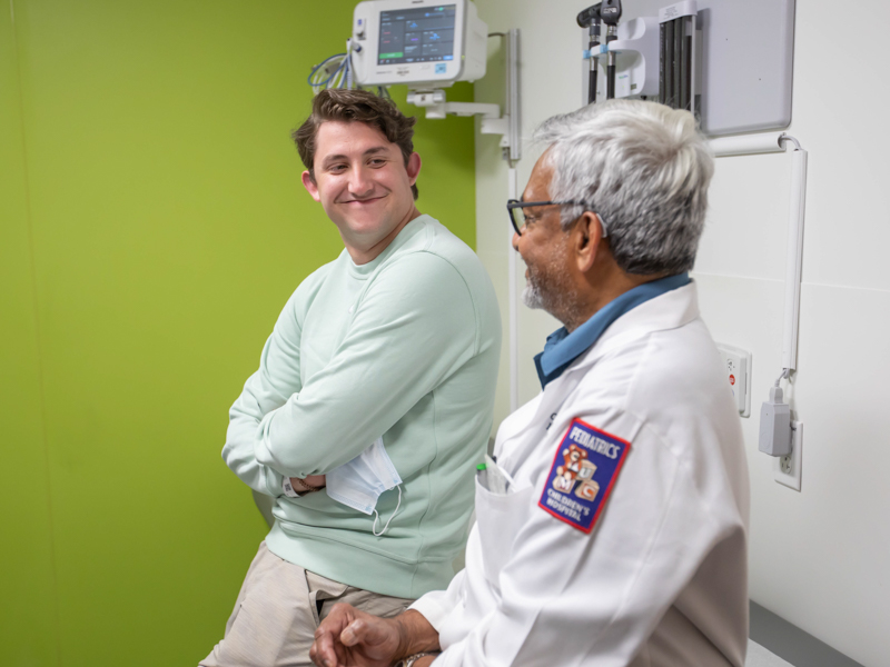 Tyler Free of Ocean Springs is alive today because of an AED. His cardiologist, Dr. Charles Gaymes, is medical director of Project ADAM, which seeks to create heart-safe schools through AEDs and training. Melanie Thortis/ UMMC Communications