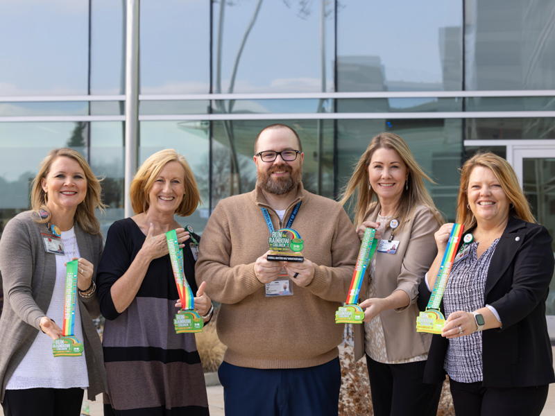 Run the Rainbow for Children's planners include, from left, Katie Sanders, Louise Dove, Jason Dill, Shannon Hoover and race director Selena Daniel, all of the Department of Pediatrics at UMMC.
