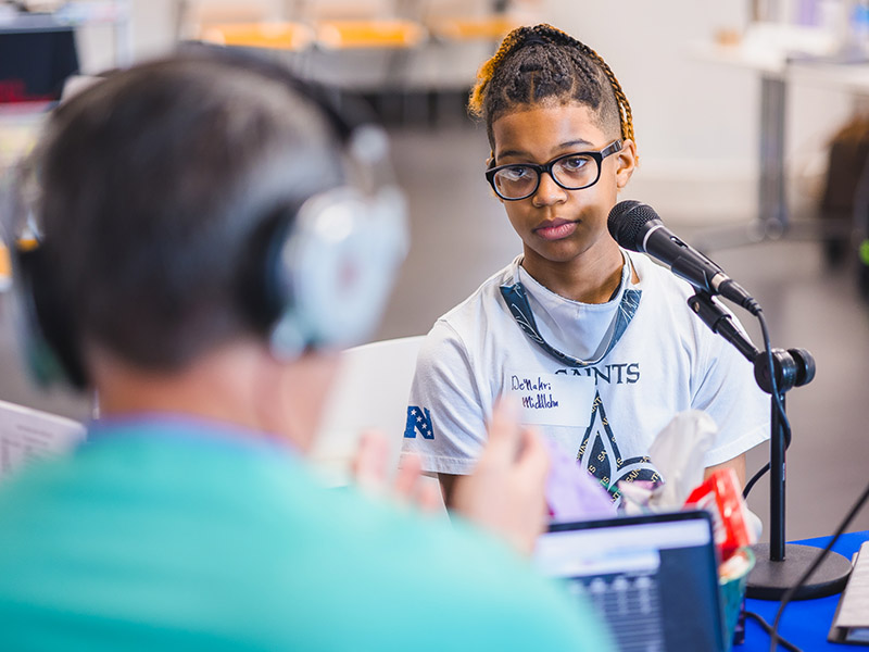 Children's of Mississippi patient De'Nahri Middleton of Jackson talks with on-air personalities during Mississippi Miracles Radiothon.