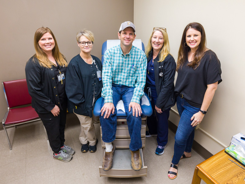 Walter Makamson is pictured with his sister and kidney donor, Maggie Gilliland, far right, and transplant care team members that include, from left, transplant coordinator Mallory Lester, social worker Becky Smith and transplant nurse practitioner Dr. Ashley Seawright.