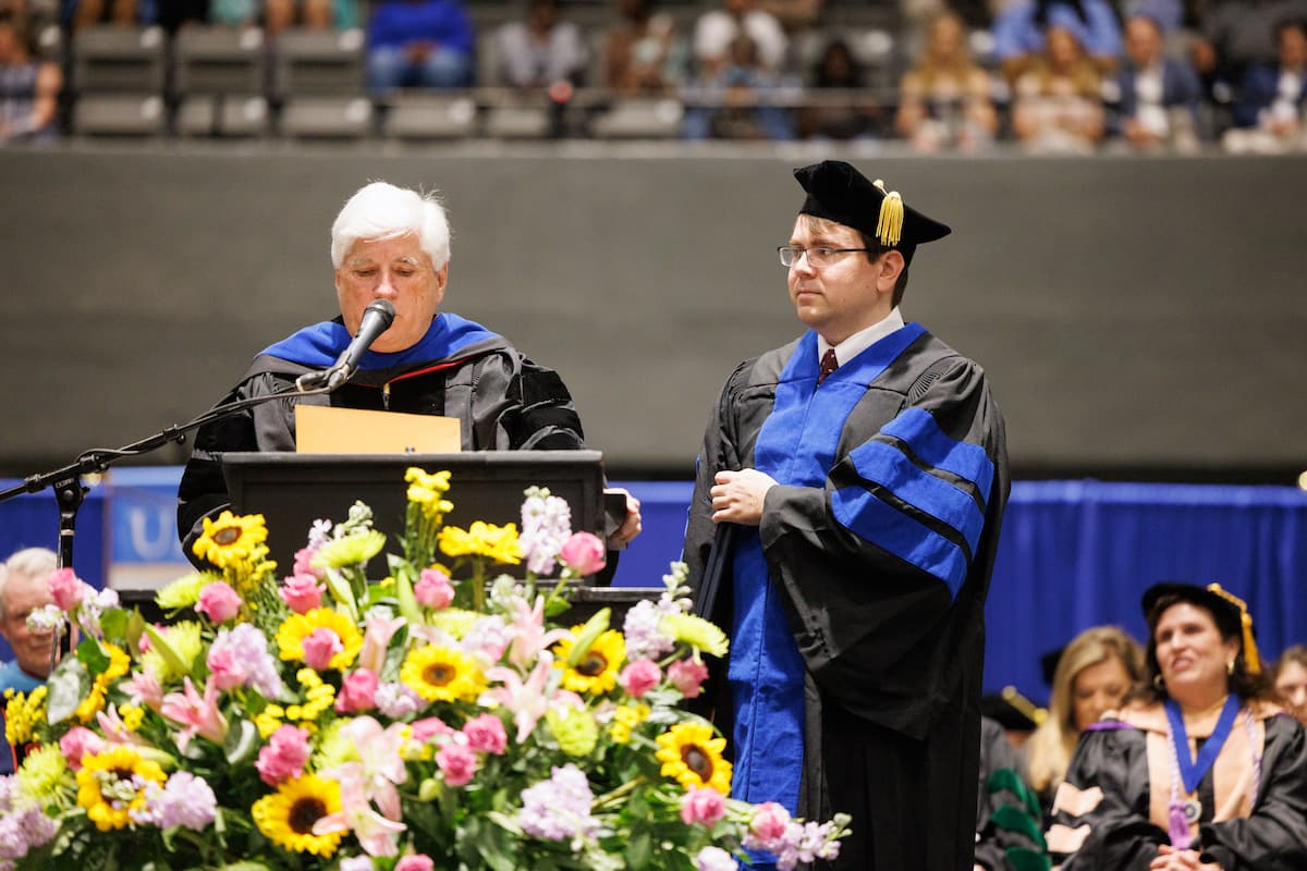 Dr. Joey Granger presents Jacob Pruett with the Robert A. Mahaffey Jr. Memorial Award.