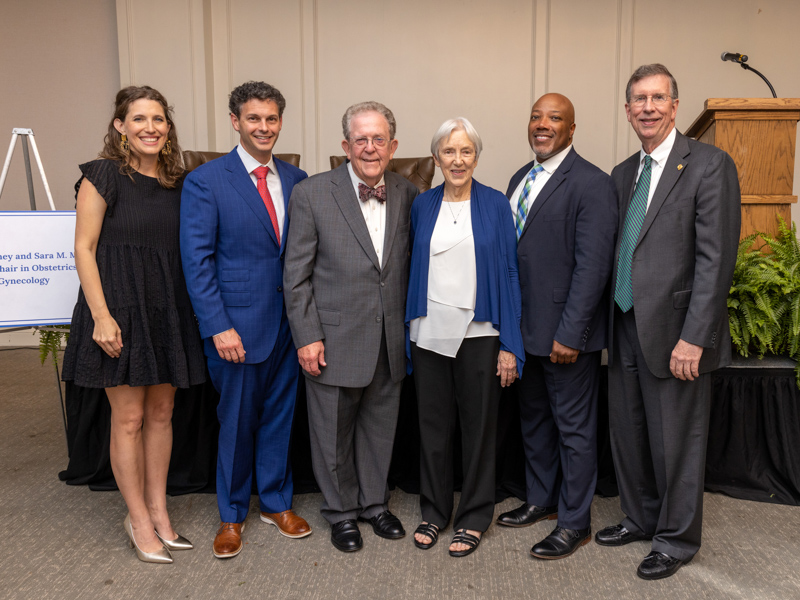 Among those who paid tribute to Dr. Rodney Meeks and Dr. Sara Meeks last Thursday at the Country Club of Jackson are, from left, Dr. Elizabeth Lutz, Dr. Paul Moore, (Rodney and Sara Meeks), Dr. Jermaine Gray and Dr. J. Martin Tucker.