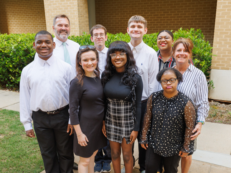 Back row, from left, Tommy Burnham, Project SEARCH job skills trainer, graduates Preston Doolie and Will Ratliff, Jasmine Lee, Project SEARCH job skills trainer, Christina Guarino, Project SEARCH instructor; front row, from left, graduates William Bailey, Reilly Easley, Shanderria Hill and Ariana Andrews