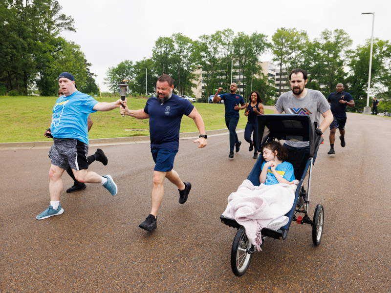 UMMC PD helps carry the torch for Special Olympics