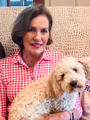 Melanie Campbell Bowman, pictured with her dog Popcorn, is a former patient in the UMMC Epilepsy Monitoring Unit.