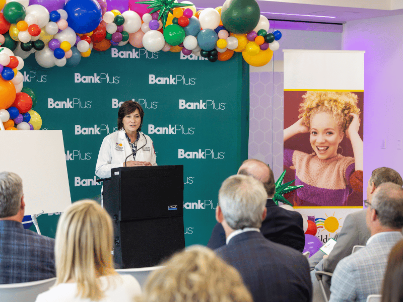 Dr. Mary Taylor, Suzan B. Thames Chair and professor of pediatrics, thanks BankPlus leaders for their years of support.