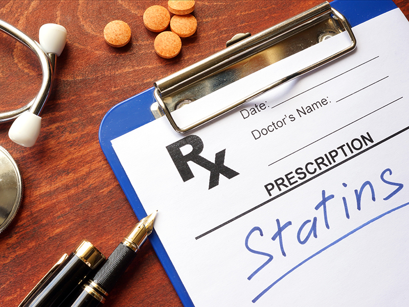 Image of prescription pad with the word "Statins" written on it.