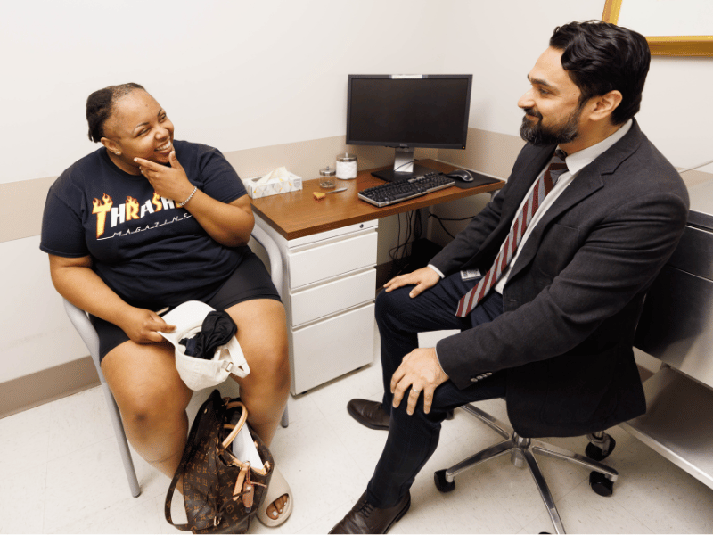 Vann, a patient of Dr. Omar Chohan, is examined during a checkup following surgery to implant a device in her brain to help prevent seizures. She is the first in Mississippi to receive the device. Melanie Thortis/ UMMC Photography