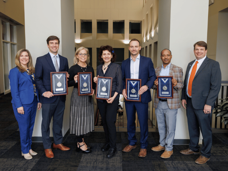 Silver award recipients, from second left to right, are Dr. Donald Clark, Dr. Carolann Risley, Dr. Barbara Gisabella, Dr. John Clemmer and Dr. Wondwosen Yimer. Not pictured is Dr. Joseph Majure.
