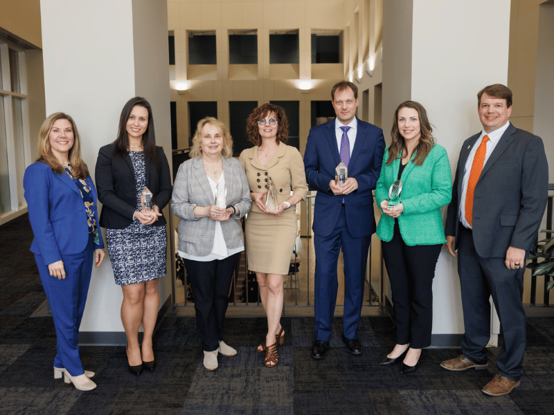 Discovery Awards recipients, from second left to right, are Dr. Lorena Amaral, Dr. Barbara Alexander, Dr. Beverly Windham, Dr. Matthias Krenn and Dr. Leslie Musshafen.