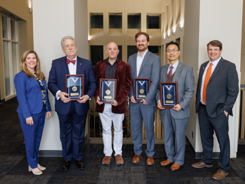 Gold award recipients, from second left to right, are Dr. Gailen Marshall, Dr. Harry Pantazopoulos, Dr. Eric Vallender and Dr. Lei Zhang. Not pictured are Dr. Adrienne Tin and Dr. Jorge Vidal.